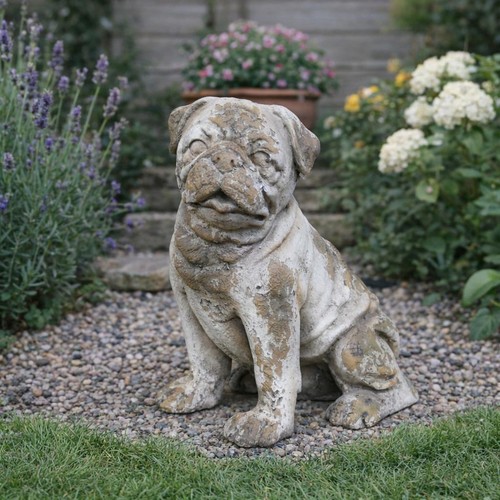 Weathered stone pug dog statue - pug,
